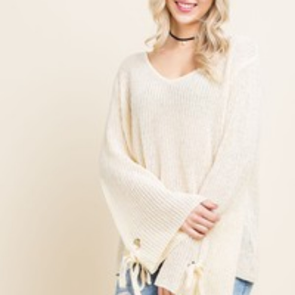 Blushing heart light knit top with bell sleeves!